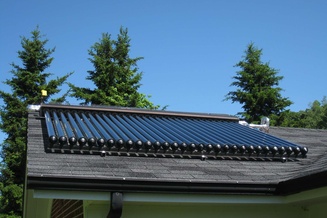 Blackburn Vannoy Farm Solar Thermal System panels on house roof.
